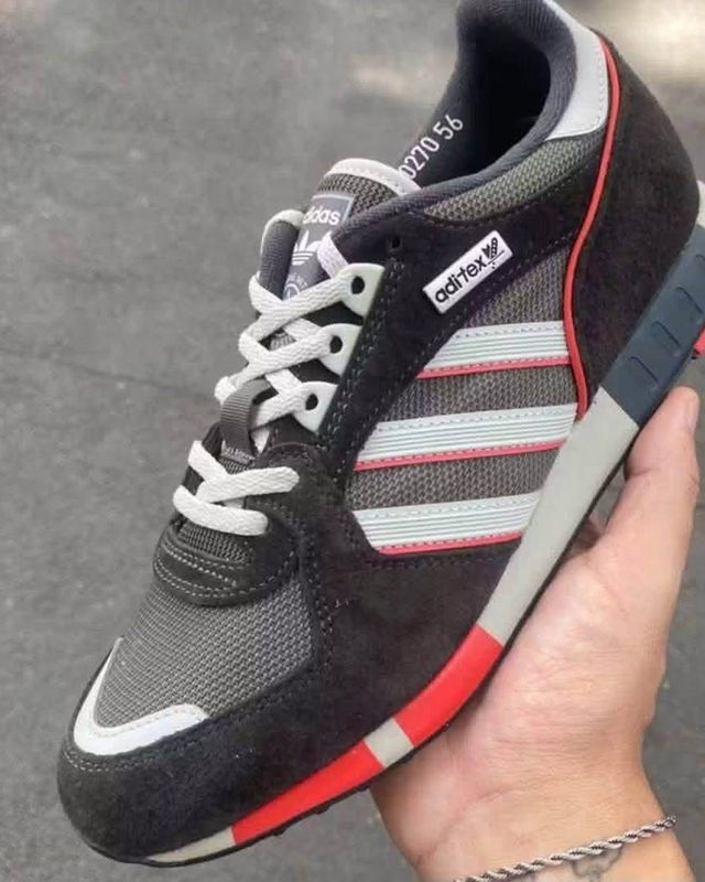 Leaked adidas AW26 Aditex runner in dark grey suede and mesh with red accents